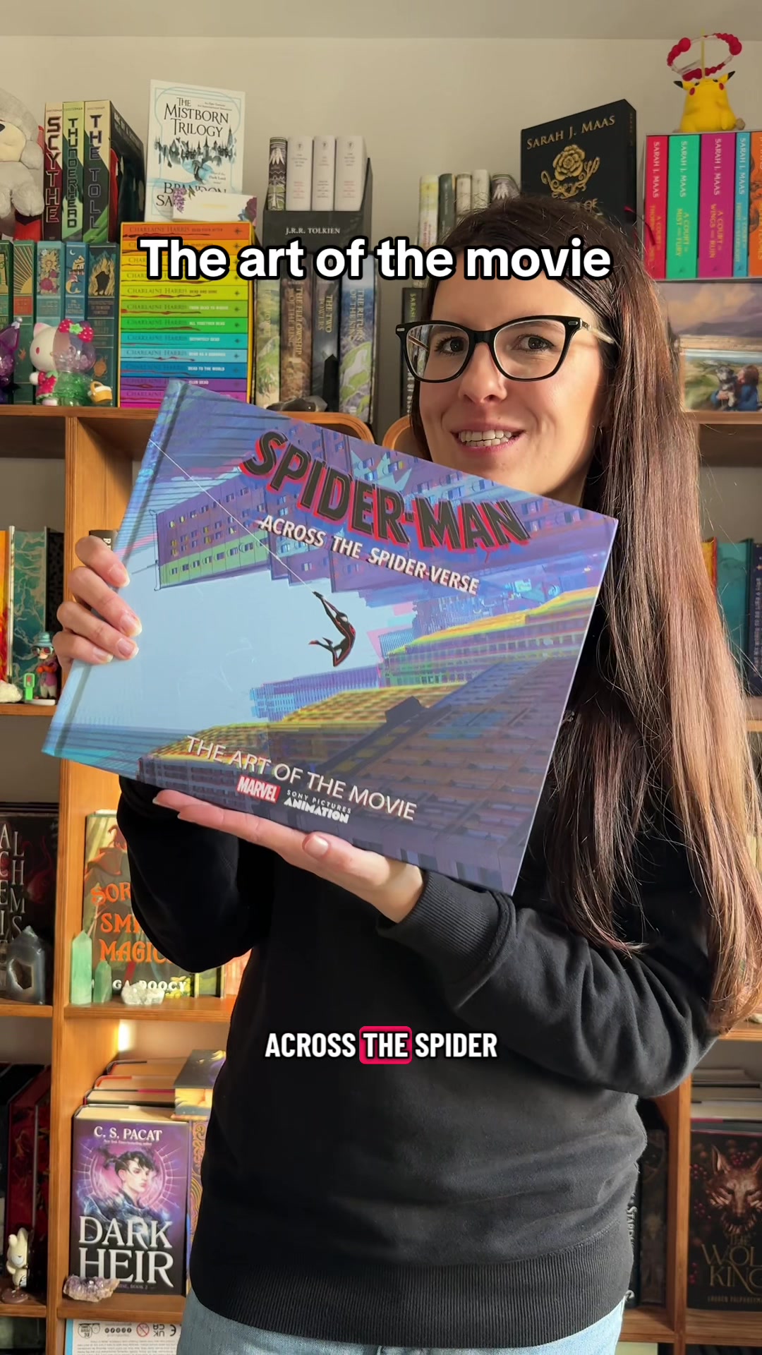 TikTok post by @violet.hollow for Books2Door. Caption reads: [...] Across the spider verse movie book....
