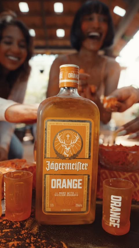 Instagram post by @prathiksha_shetty for Jägermeister. Caption reads: Drenched in orange and vibing with ice cold shots....