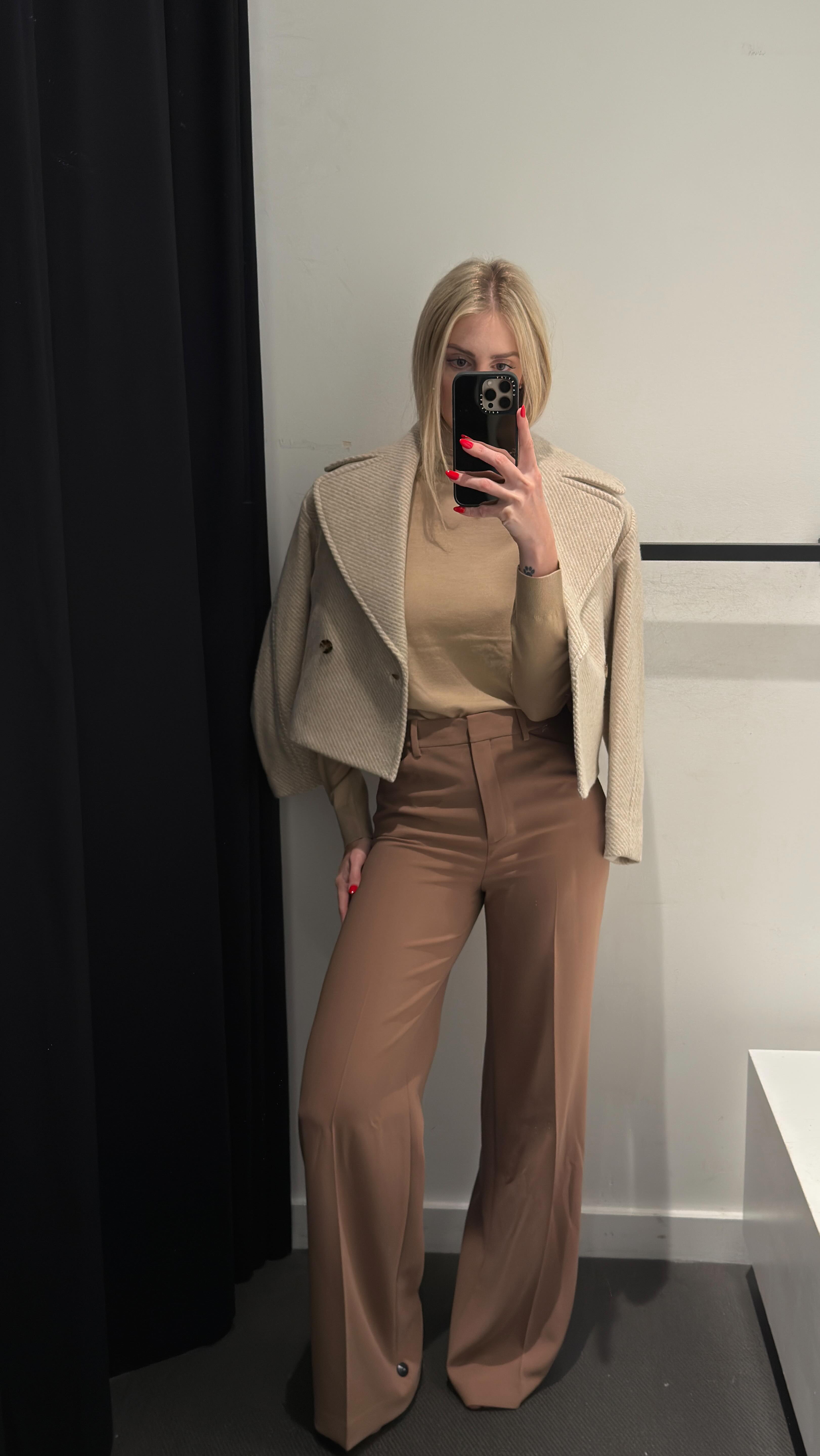 Instagram post by @karenchaiane for Theory. Caption reads: In 1997, @theory__ was founded on a simple yet....