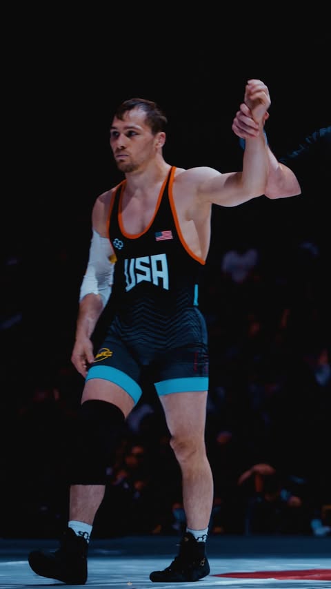 Instagram post by @usawrestling for FloWrestling. Caption reads: Spencer Lee gets one back on Luke Lilledahl....