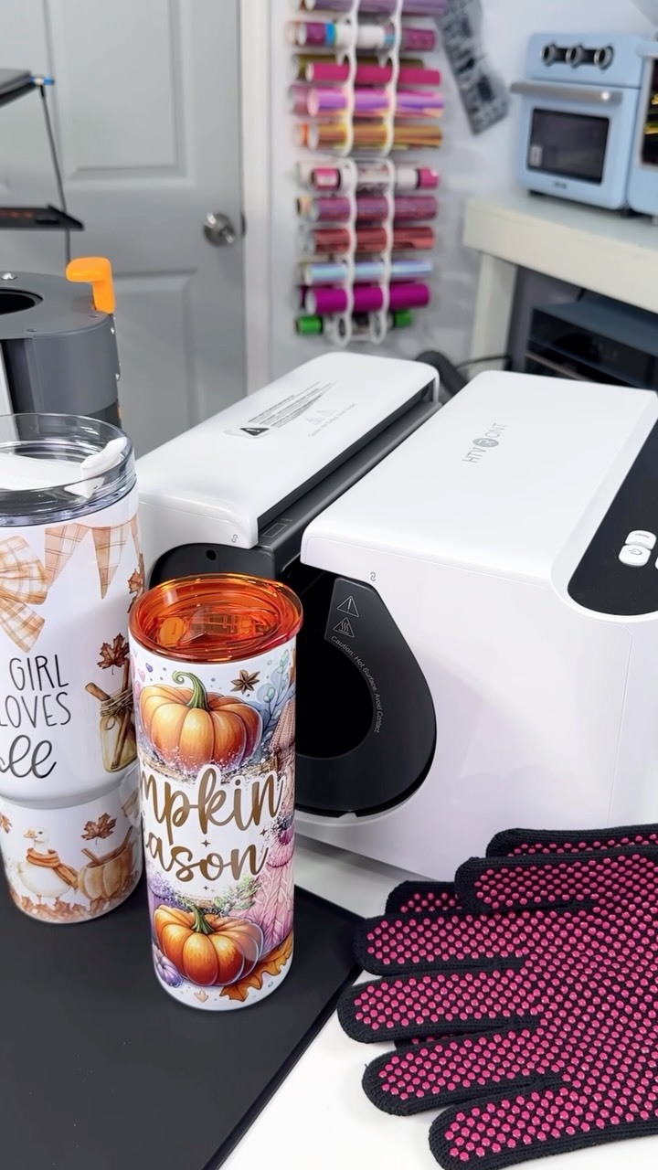 Instagram post by @cocoprintdesign for HTVRONT. Caption reads: NEW HTVRONT A200 Auto Tumbler Heat Press 😍🧡....