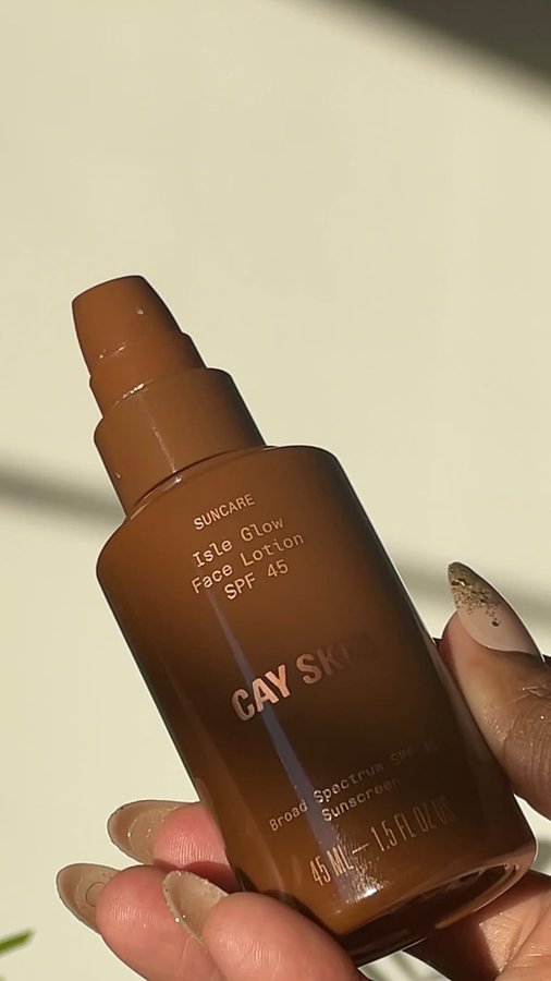 Instagram post by @joynavon for Cay Skin. Caption reads: @cayskin holiday bundles are here! I got my hands....