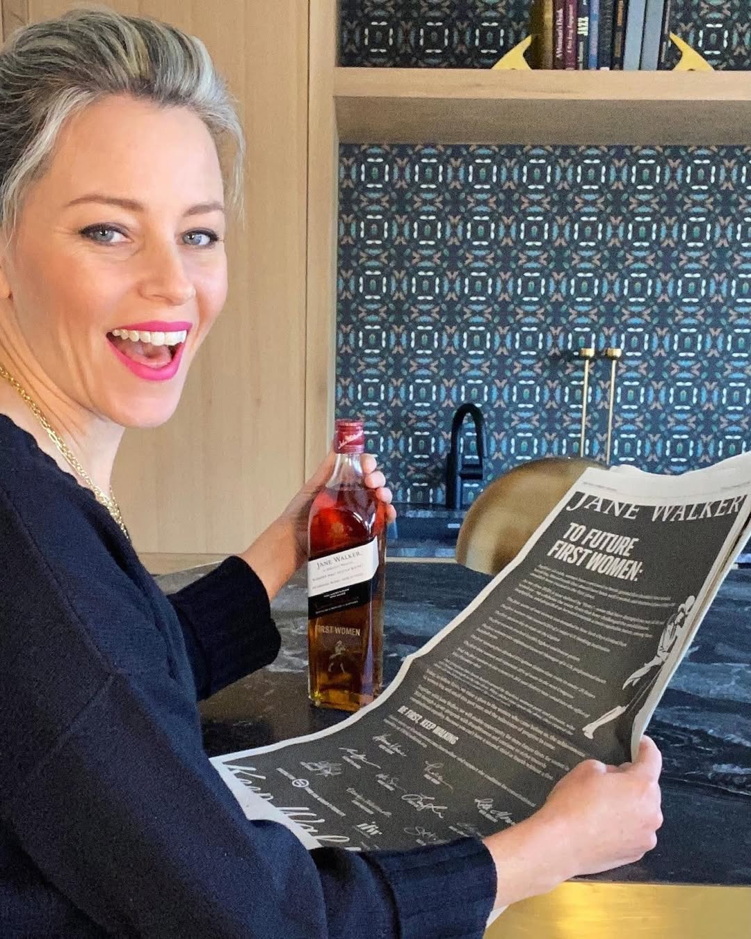 Instagram post by @elizabethbanks for Johnnie Walker US. Caption reads: I am honored to officially partner with....