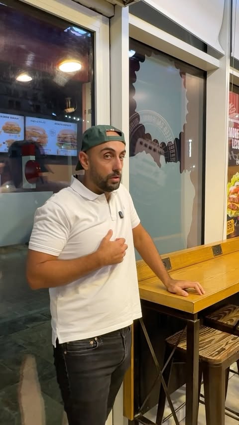 Instagram post by @kareemsamad for Hardee's. Caption reads: This is your sign to stay hydrated @hardeesuae.