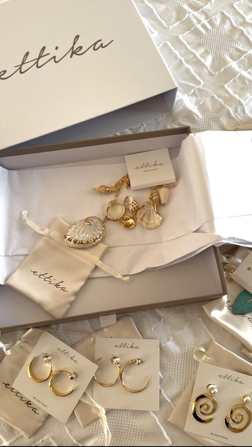 Instagram post by @nelanieturli for Ettika. Caption reads: Post your content girl ✨ @ettika #reels #girls....