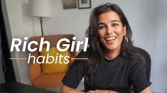 YouTube post by @nischa for Fiverr. Caption reads: 8 TINY Habits to Become Financially Literate In....
