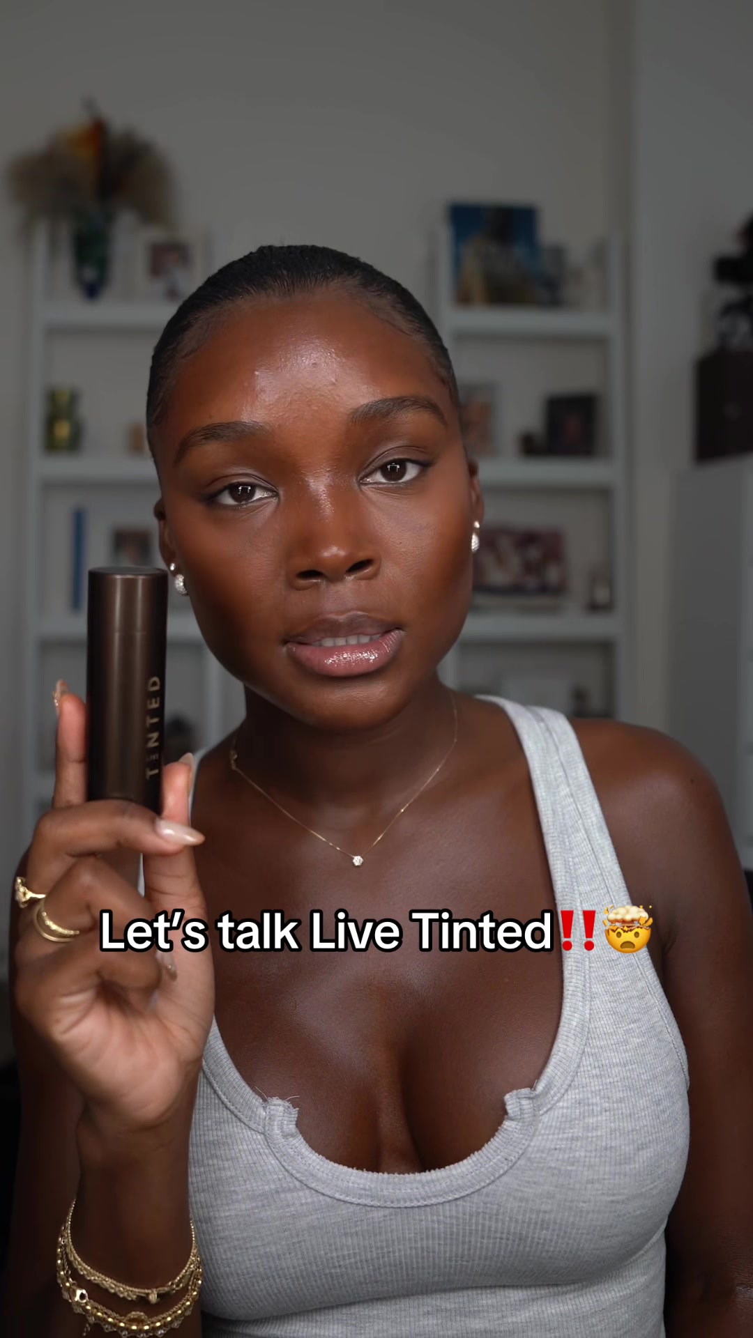 TikTok post by @melinda_melrose for LIVE TINTED. Caption reads: @livetinted what did you put inside this hue stick....