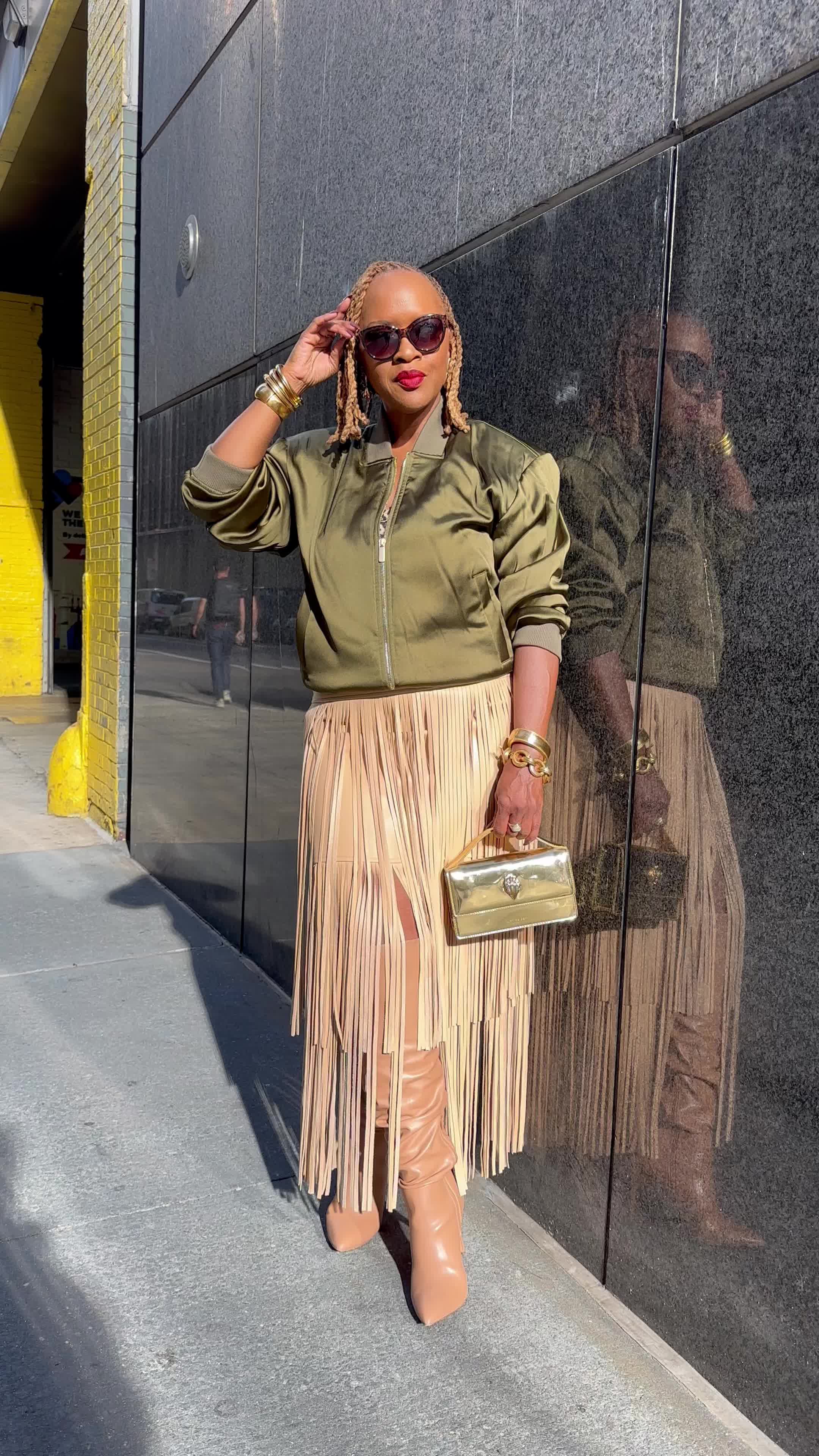 TikTok post by @travelladyshops for The Lip Bar. Caption reads: [...] fun outfit Skirt @AKIRA Lip @thelipbar Bag....