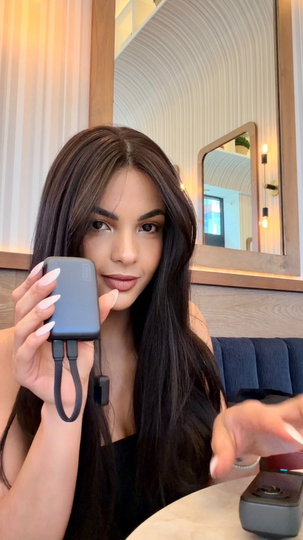 Instagram post by @eva_sita for INIU Shop. Caption reads: My phone was dying, my camera too… and every....