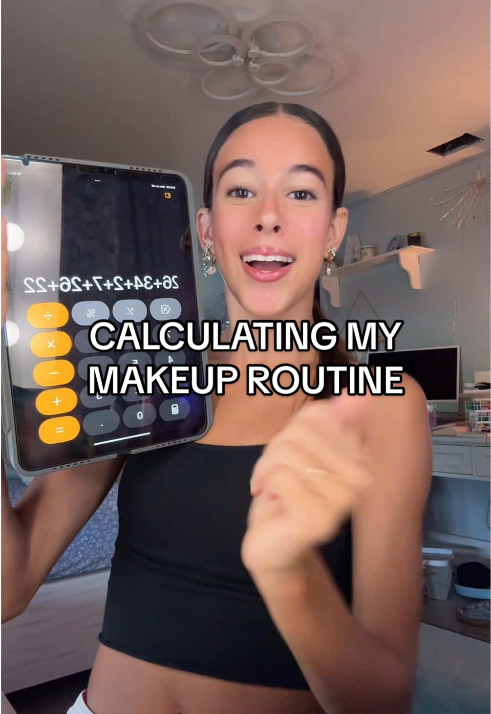 TikTok post by @avaabronson for ONE SIZE BEAUTY. Caption reads: 💄CALCULATING MY MAKEUP ROUTINE 💸 #viral #trend....