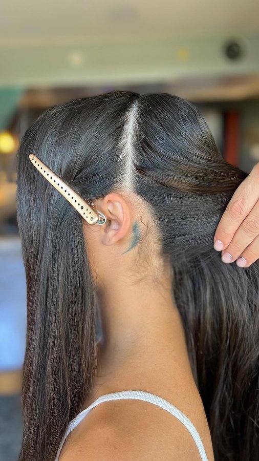 Instagram post by @sarahpagehair for American Salon. Caption reads: Watch till the end to see how I strategically....