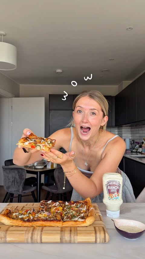 Instagram post by @emsbalance for Heinz. Caption reads: [...] puff pastry pizza !! smothereddddd in....
