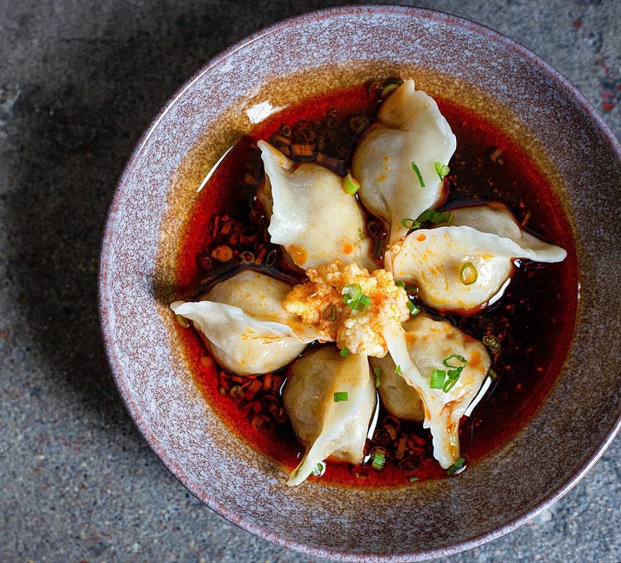 Instagram post by @kmlpeterson for Foodie Tribe. Caption reads: I'm always down for dumplings😍 @junnorthloop is....