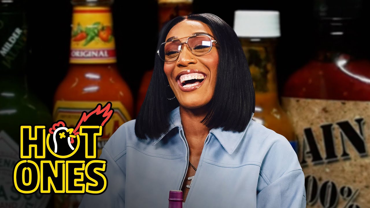 YouTube post by @FirstWeFeast for First We Feast. Caption reads: A’ja Wilson Insists She’s Good While Eating Spicy....