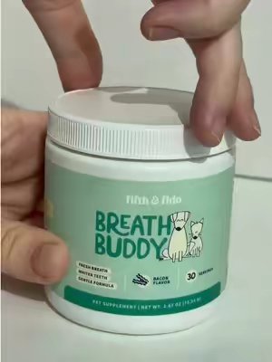 TikTok post by @kaelinperuche for Fifth & Fido. Caption reads: [...] you need this. 🐶🦷 Just sprinkle Fifth &....