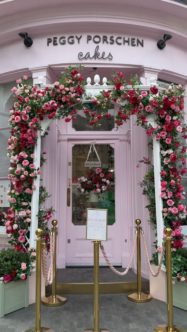 Instagram post by @beachseakers for Peggy Porschen. Caption reads: [...] in London for Afternoon Tea 🫖🌸🎀 Peggy....