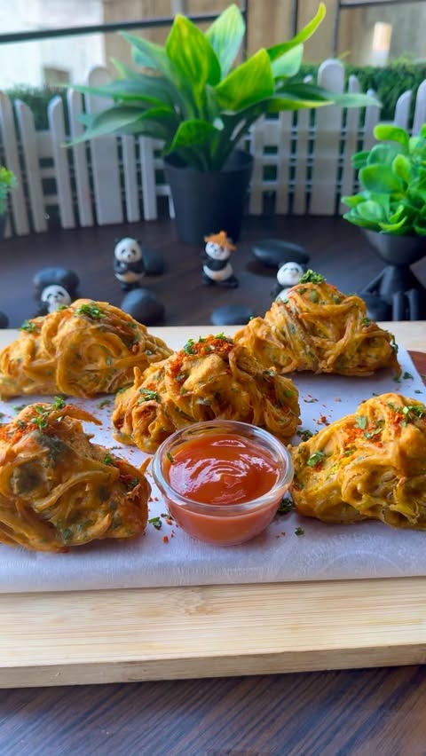 Instagram post by @agarnishbowl for Emami Healthy & Tasty. Caption reads: Onion Paneer Pakoda Do support us and do like,....