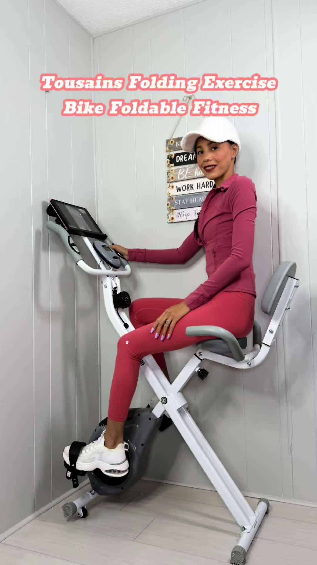 TikTok post by @virgtify for TOUSAINS. Caption reads: Tousains Folding Exercise Bike Foldable Fitness....