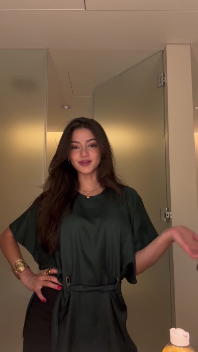 TikTok post by @laynasacino for Garnier. Caption reads: Mon @Garnier Micellar enlève le maquillage sans....