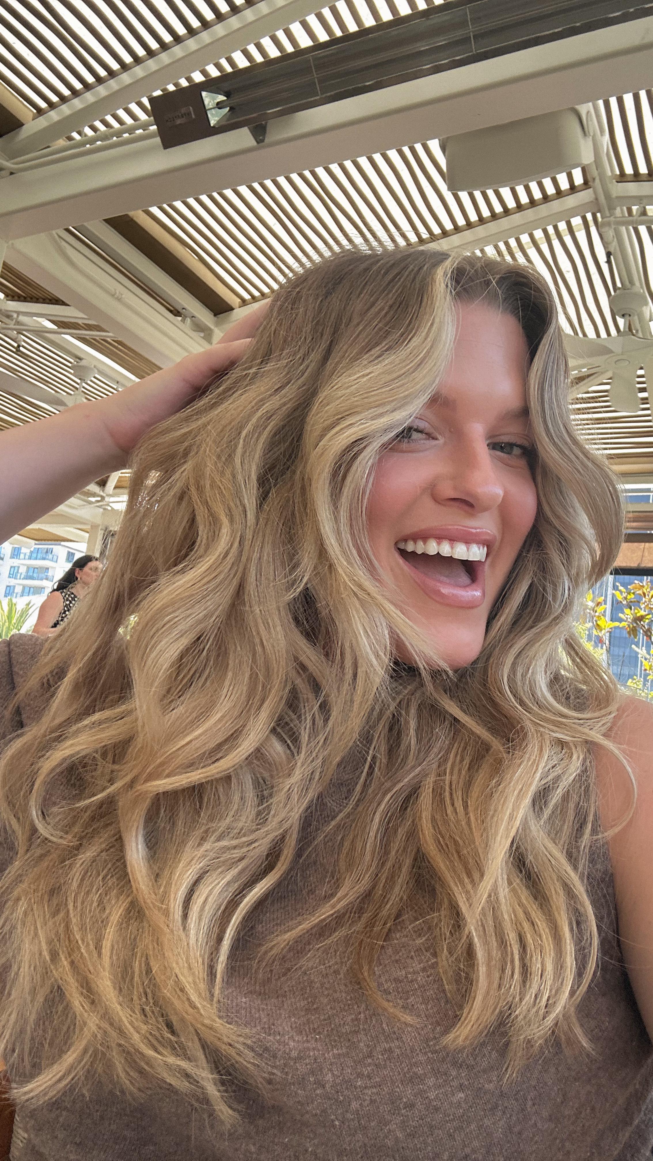 Instagram post by @astoldbymeredith for Revlon Hair Tools. Caption reads: 5 days, 5 styles, 1 tool. the @revlonhairtools....