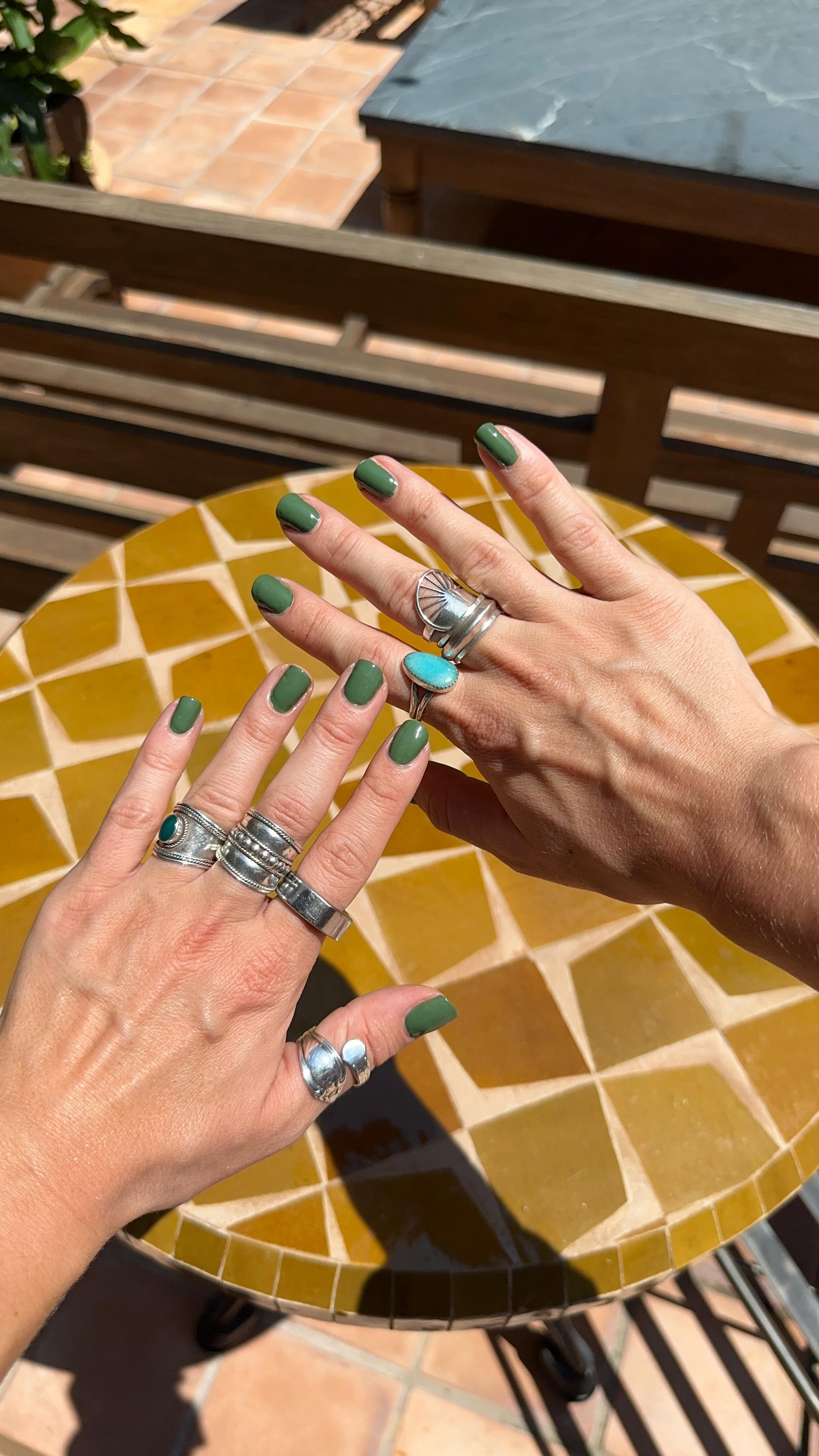 Instagram post by @ivybitetti for Dazzle Dry. Caption reads: one of my fav outfit accessories is colorful nails....