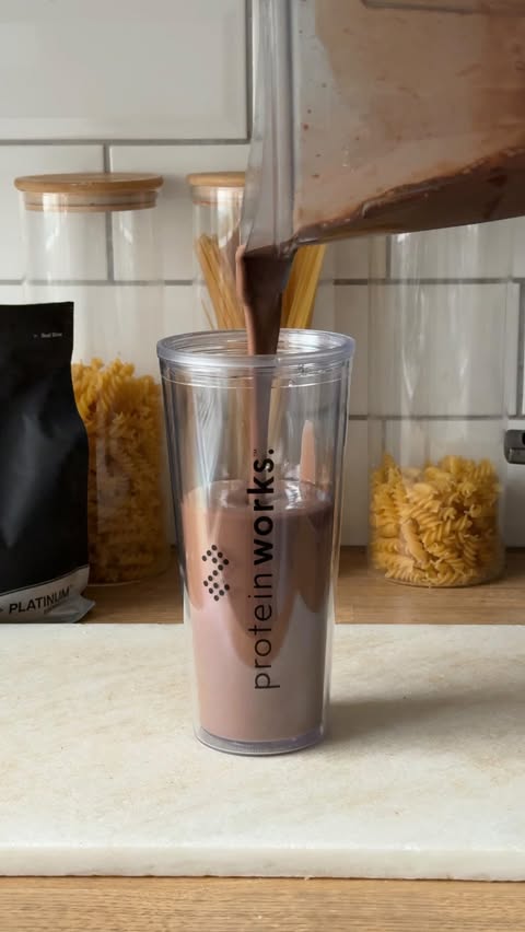 Instagram post by @lifewith.leila for Protein Works. Caption reads: 🍫 CHOC PB SMOOTHIE; using @proteinworks vegan....