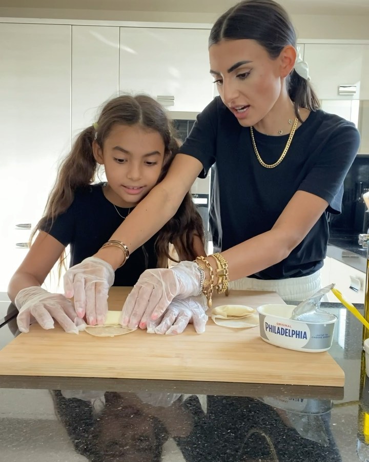 Instagram post by @rimazahran for Philadelphia. Caption reads: [...] creamy cheese spring rolls with....