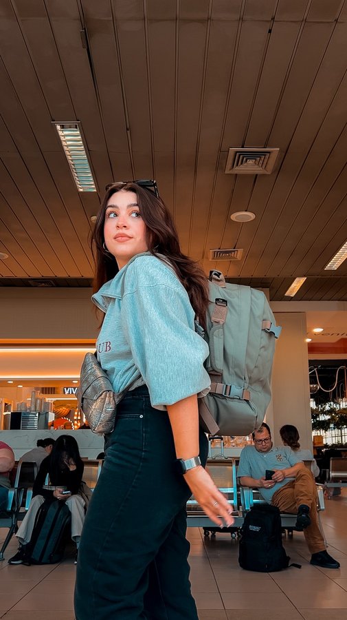 Instagram post by @nicoletabreazu for CABINZERO. Caption reads: [...] need a suitcase for every trip. this....