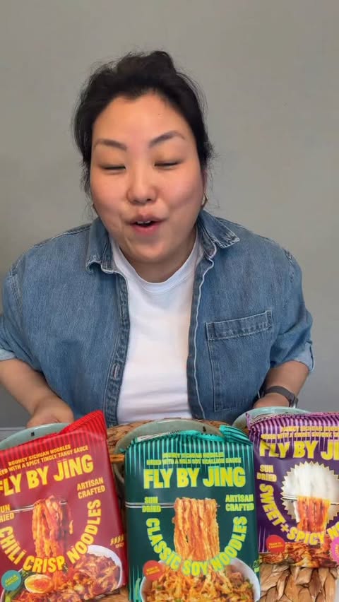 Instagram post by @millennial_umma for FLY BY JING. Caption reads: [...] the amount of flavor packed in these Fly By....