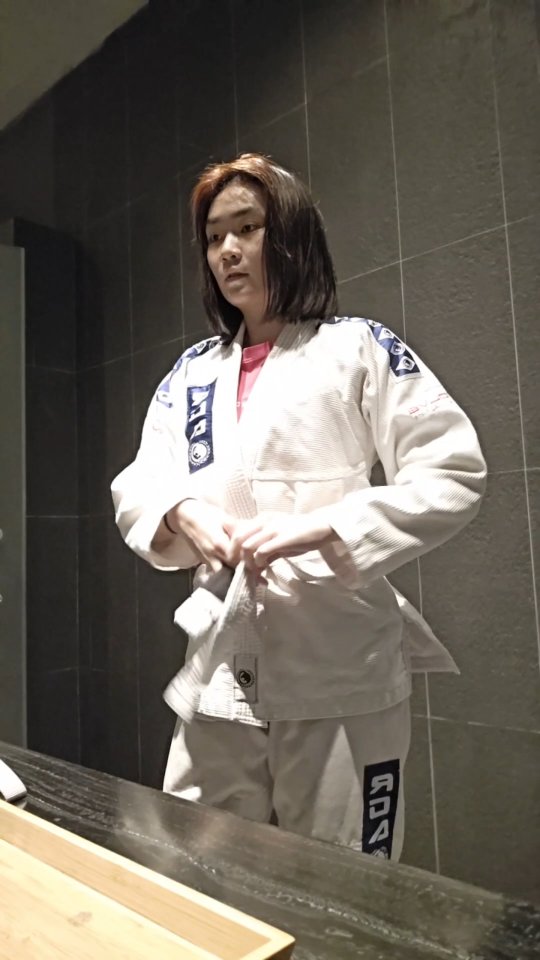 Instagram post by @irollwithsushiroll for LSKD. Caption reads: GRWM for BJJ in the new @lskd Breast Cancer....