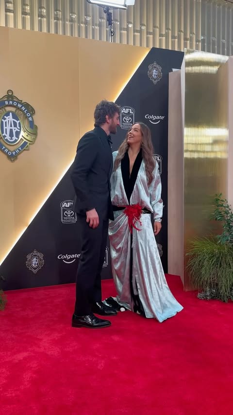 Instagram post by @neila.bont for Colgate. Caption reads: Bont and his wife Neila take the carpet ❤️.