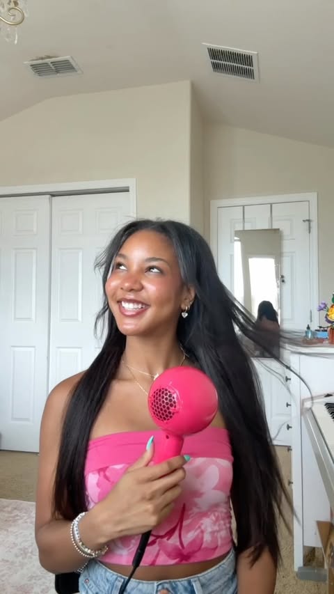Instagram post by @kamrynbhall for Conair. Caption reads: [...] Obsessed with this Hot Pink!! Love u @conair....
