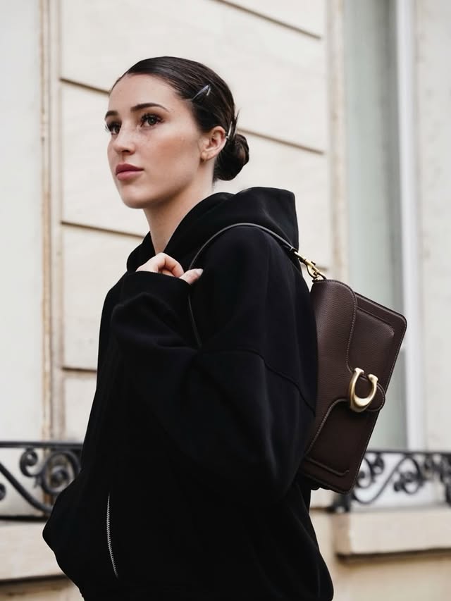 Instagram post by @elsa.jacquemot for Coach. Caption reads: [...] of mind, with a little Parisian energy.....