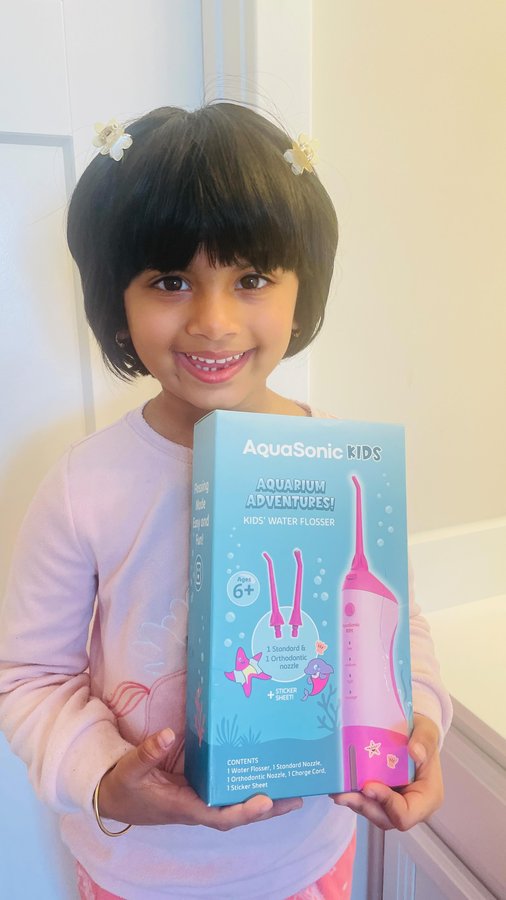 Instagram post by @dynamic_drishana for AquaSonic. Caption reads: [...] a fun routine for your kids with the....