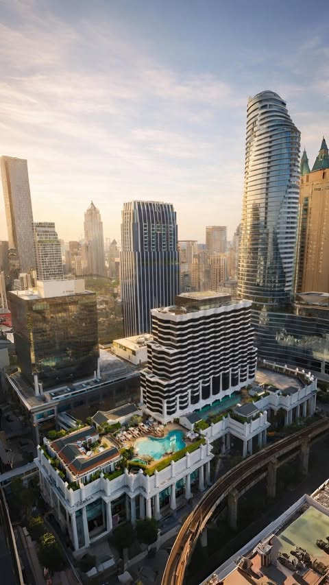Instagram post by @thystravel for Grand Hyatt. Caption reads: City views, calm moments @grandhyatterawan 🌿 From....