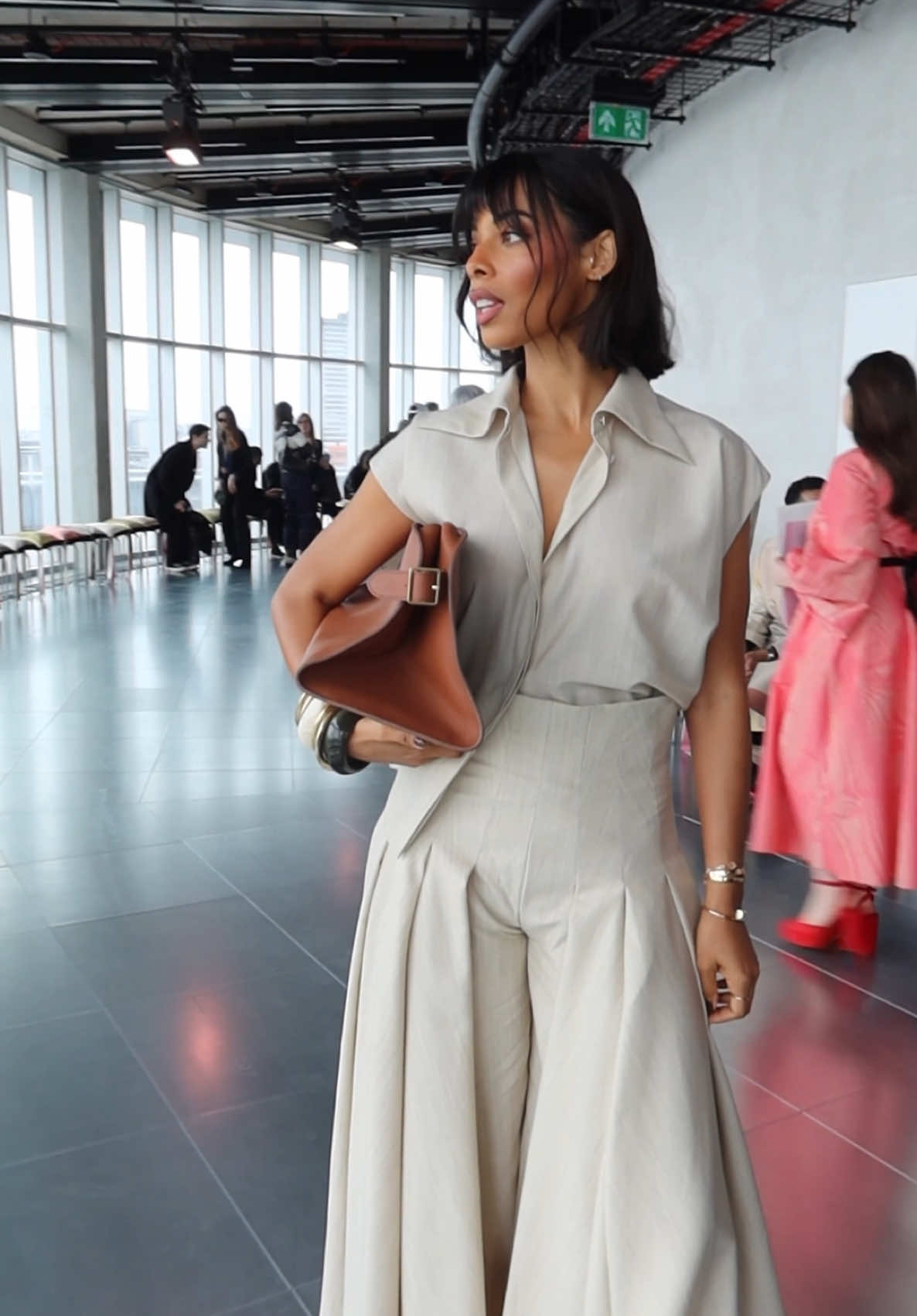 TikTok post by @rochellehumes for London Fashion Week. Caption reads: #GRWM for @LONDON FASHION WEEK. As an official....