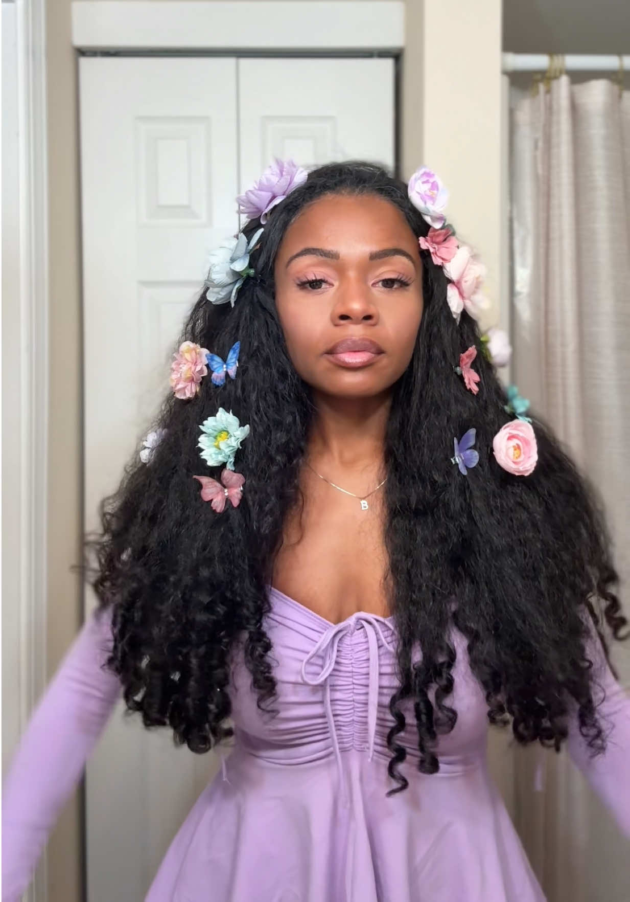 TikTok post by @latoyarena for West Kiss Hair. Caption reads: 🧚🏾‍♀️ @WestKiss Hair #halfwig #wiginstall....