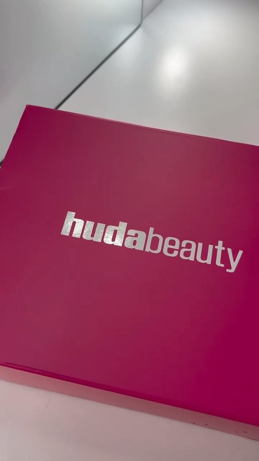 Instagram post by @aniichakhunashvili for Huda Beauty. Caption reads: @hudabeauty never misses 🌸🩷✨
Can’t wait to play....