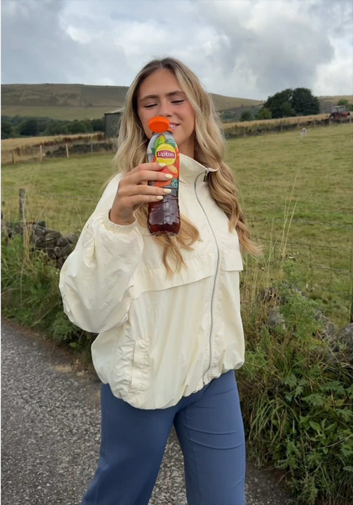TikTok post by @elliecraven0 for Lipton Ice Tea Switzerland. Caption reads: Our daily fix for our summer walks 🫡....