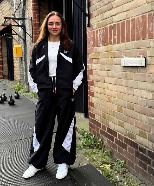 Instagram post by @justine.kachaeva for Reebok. Caption reads: [...] Ngl this outfit’s sick. Head to toe....