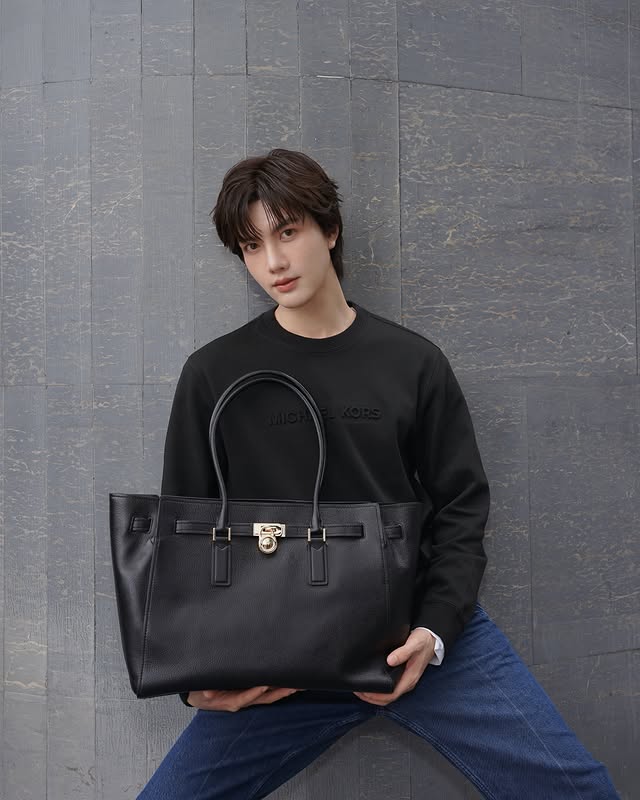 Instagram post by @tongthk for Michael Kors. Caption reads: Refined, without trying.
Ease, with....