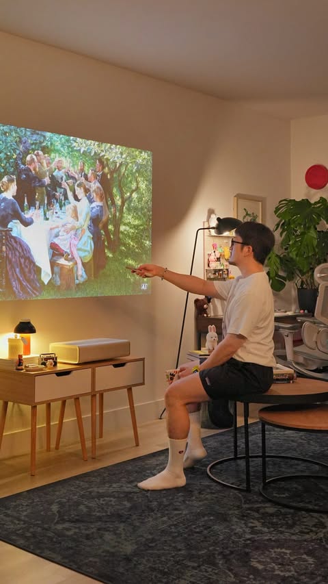 Instagram post by @hiroshige_eto for XGIMI. Caption reads: [...] I’m not watching anything, I can use the....