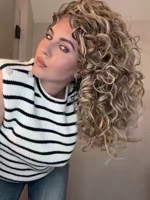 TikTok post by @curlykiet for Bali Curls. Caption reads: It’s Washday 🫧 Products used @Bali Curls....