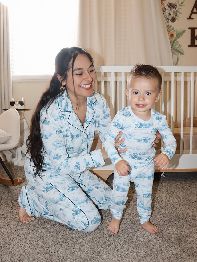 Instagram post by @arybindrup for Posh Peanut. Caption reads: [...] with my baby boy 🤍 Matching PJs from....
