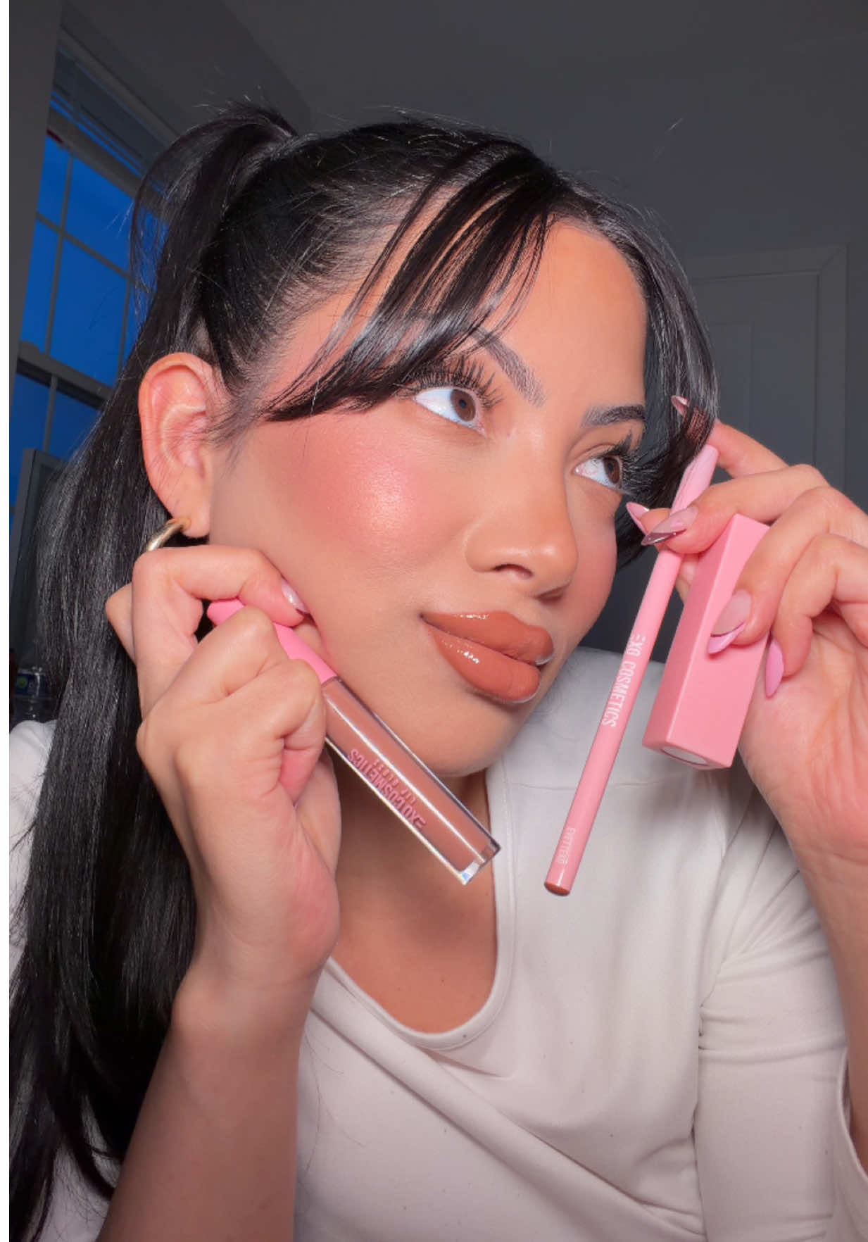 TikTok post by @glambervcruz for EXO Cosmetics. Caption reads: Evettexo lip combo is back😍👄 @EXO Cosmetics....