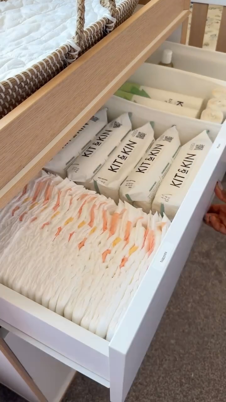 Instagram post by @adenikeo_ for Kit & Kin. Caption reads: Organise the nursery drawer using all our faves....