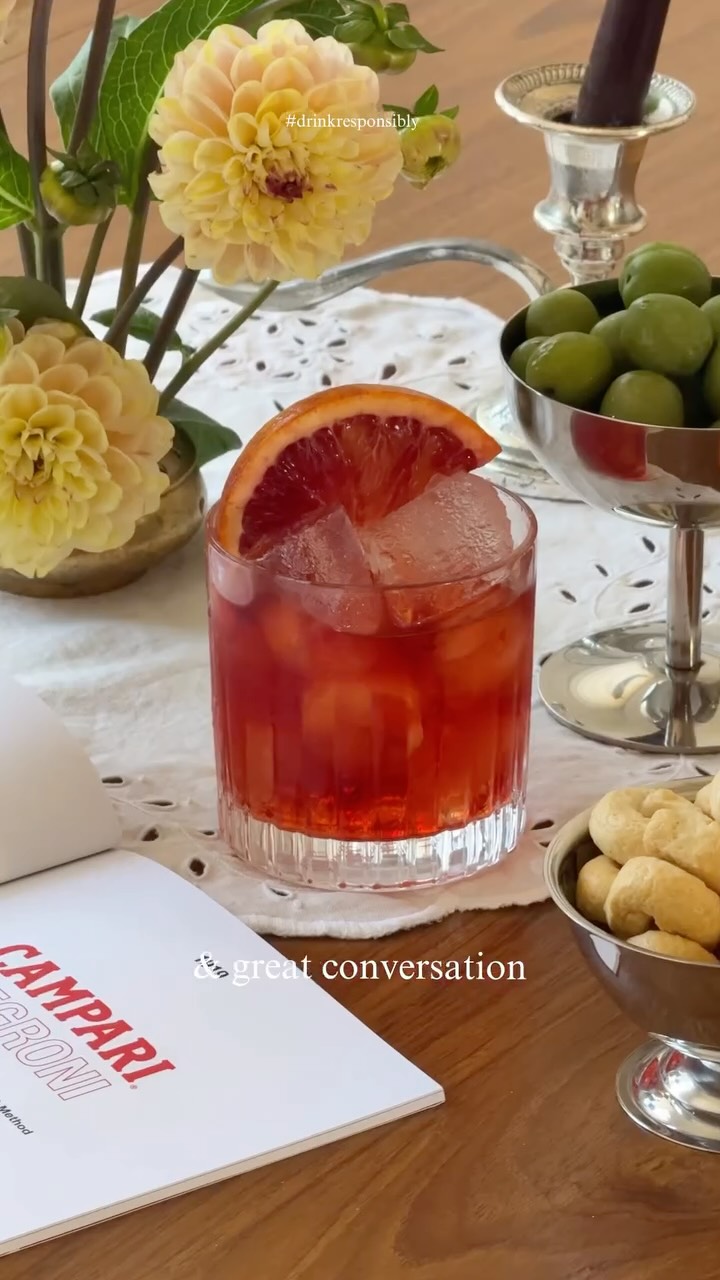 Instagram post by @harmonyyoungs for Campari. Caption reads: Ad Celebrate the Negroni with me over aperitivo at....