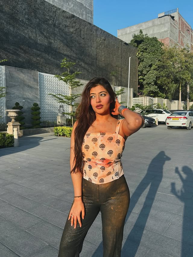 Instagram post by @tanyaaak___ for Jägermeister. Caption reads: Holi Scenes🧡 Orange Kinda madness w....