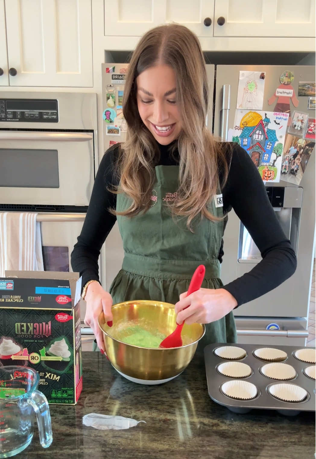 TikTok post by @stassischroeder for Betty Crocker. Caption reads: Made Hartford Wicked cupcakes and got… Elphaba.....