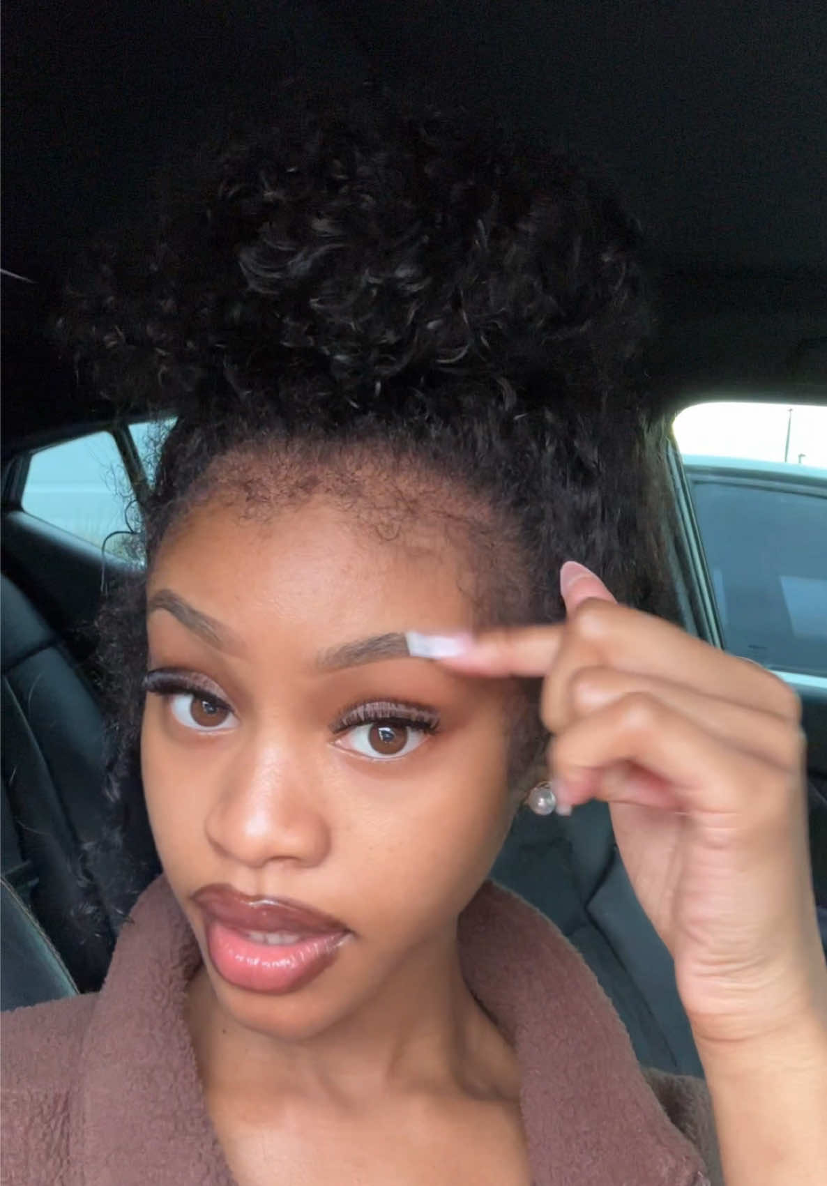 TikTok post by @x0.dasia for Ashimary Hair. Caption reads: @Ashimary 🤭🔥 #ashimaryhair #kinkycurlyhair....